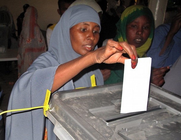 A woman casts her ballot on June 26, 201