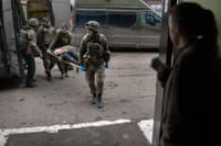 Transporting a wounded soldier to Bakhmut hospital on Friday. The day before, 240 people were admitted to the hospital.