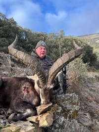 Vasily Shestakov posing with a dead animal in Spain