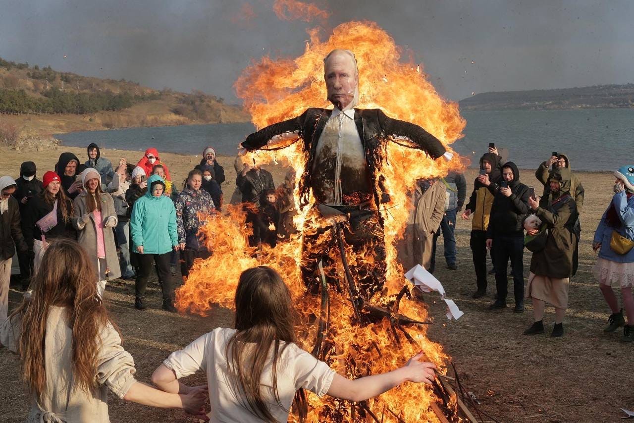 Pussy Riot band member prosecuted for burning Putin's effigy and Russian flag in Tbilisi