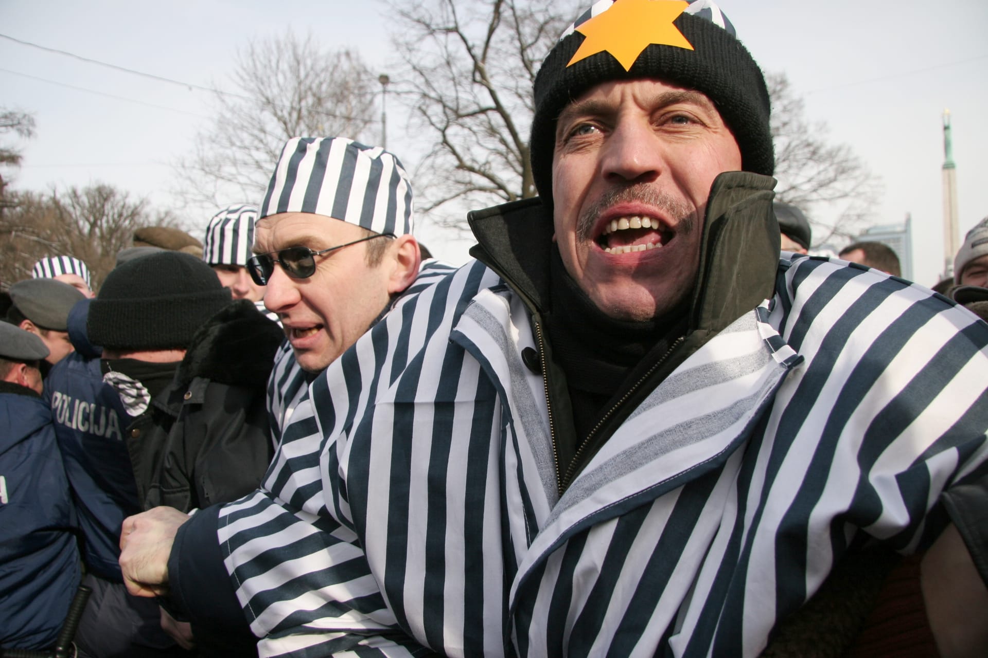 "Anti-fascists” dressed up as Jewish concentration camp inmates — replete with yellow stars on their chests — attended the Remembrance Day of the Latvian Legionnaires in Riga on March 16, 2005.