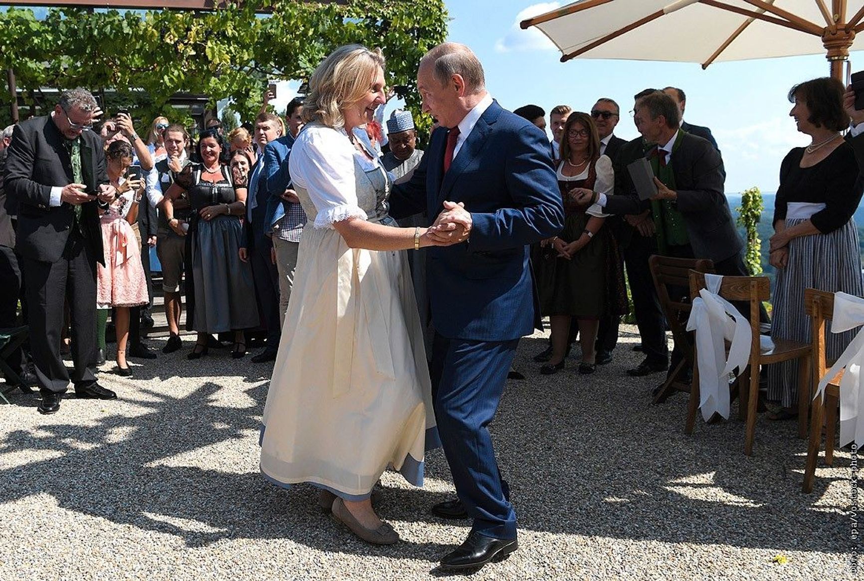 Kneissl dancing with Putin at her wedding in 2018