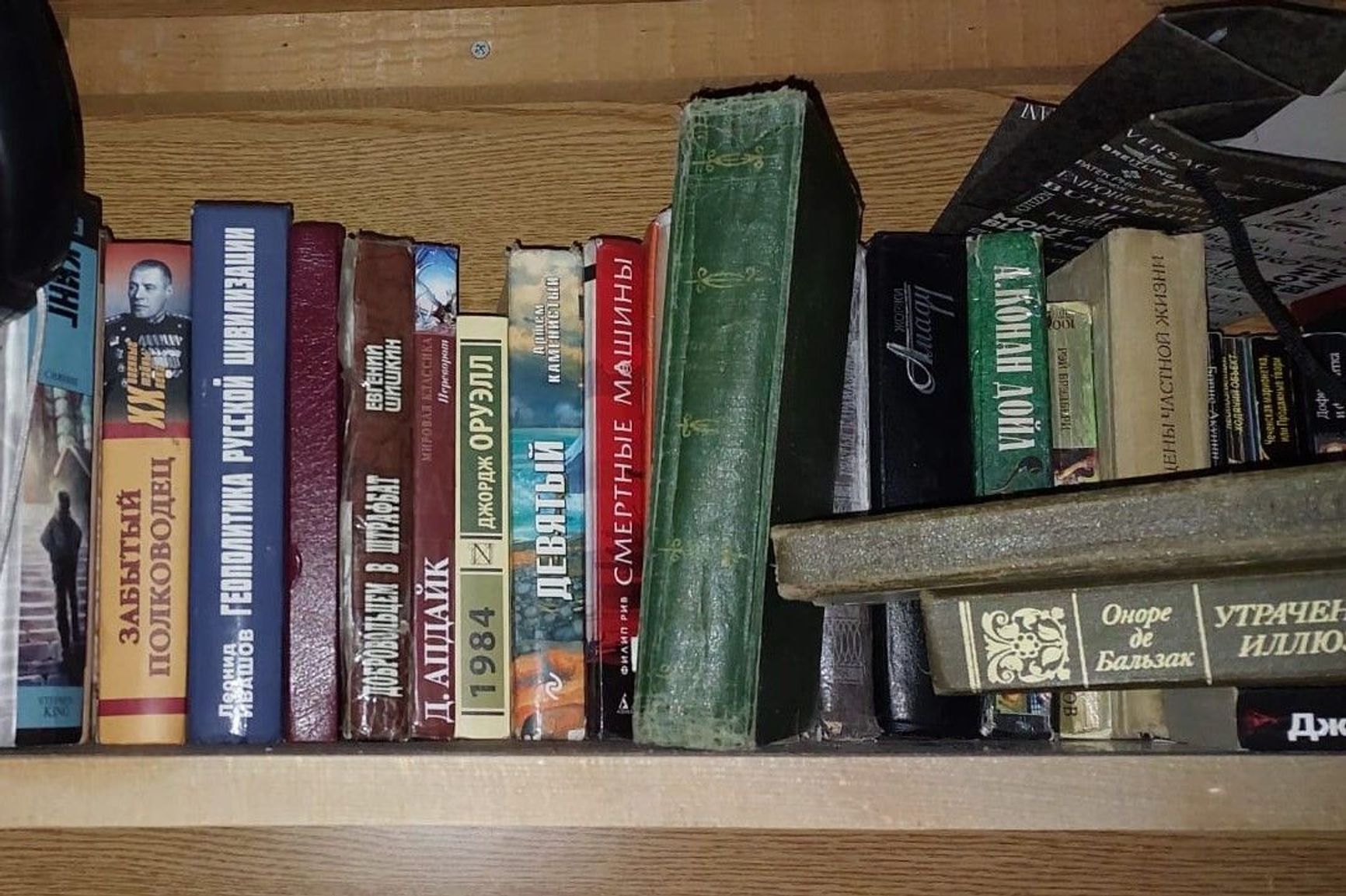 A bookshelf at an observation post abandoned by Russian troops.