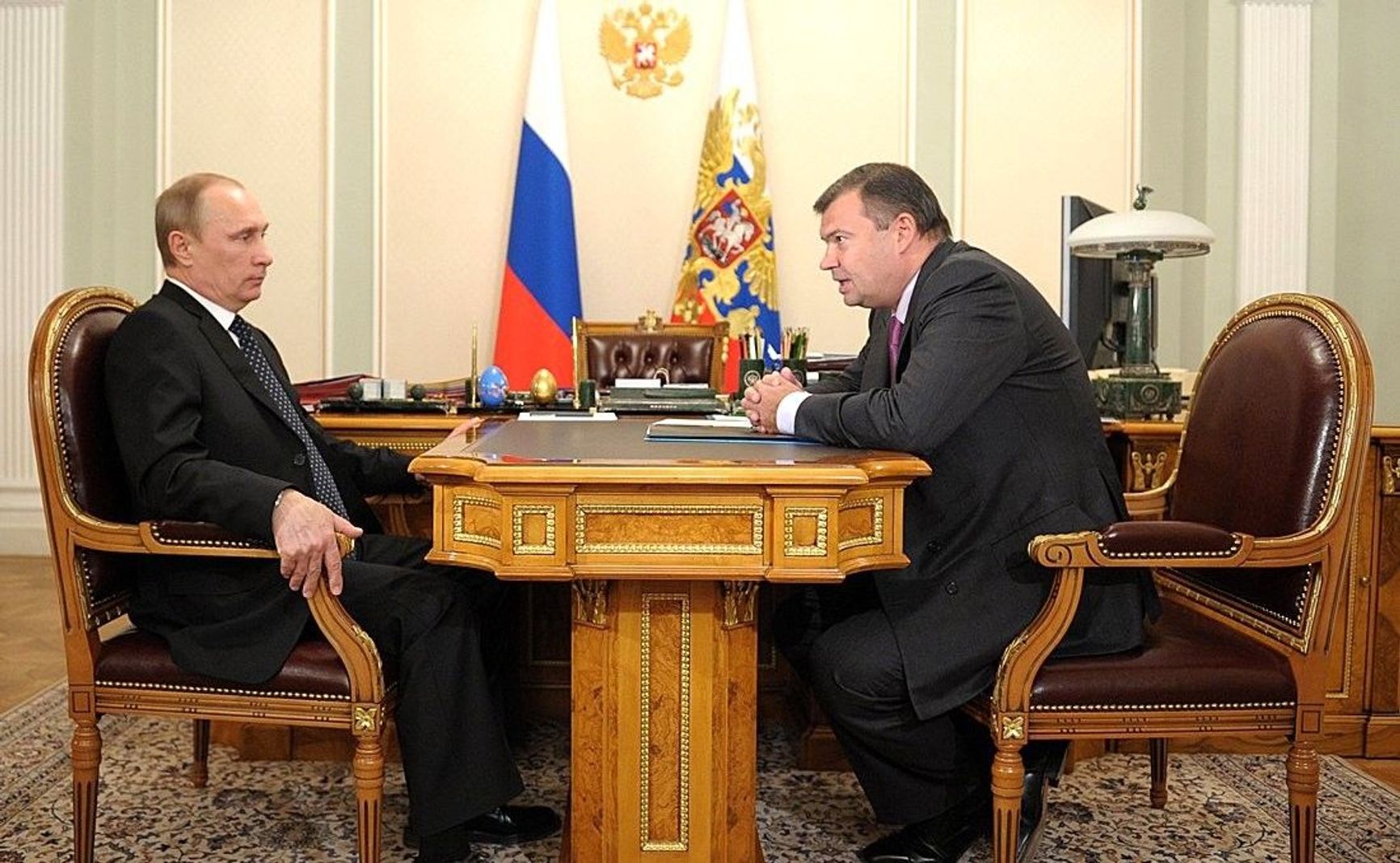 Vladimir Putin at a meeting with Transmashholding president Andrei Bokarev in February 2014