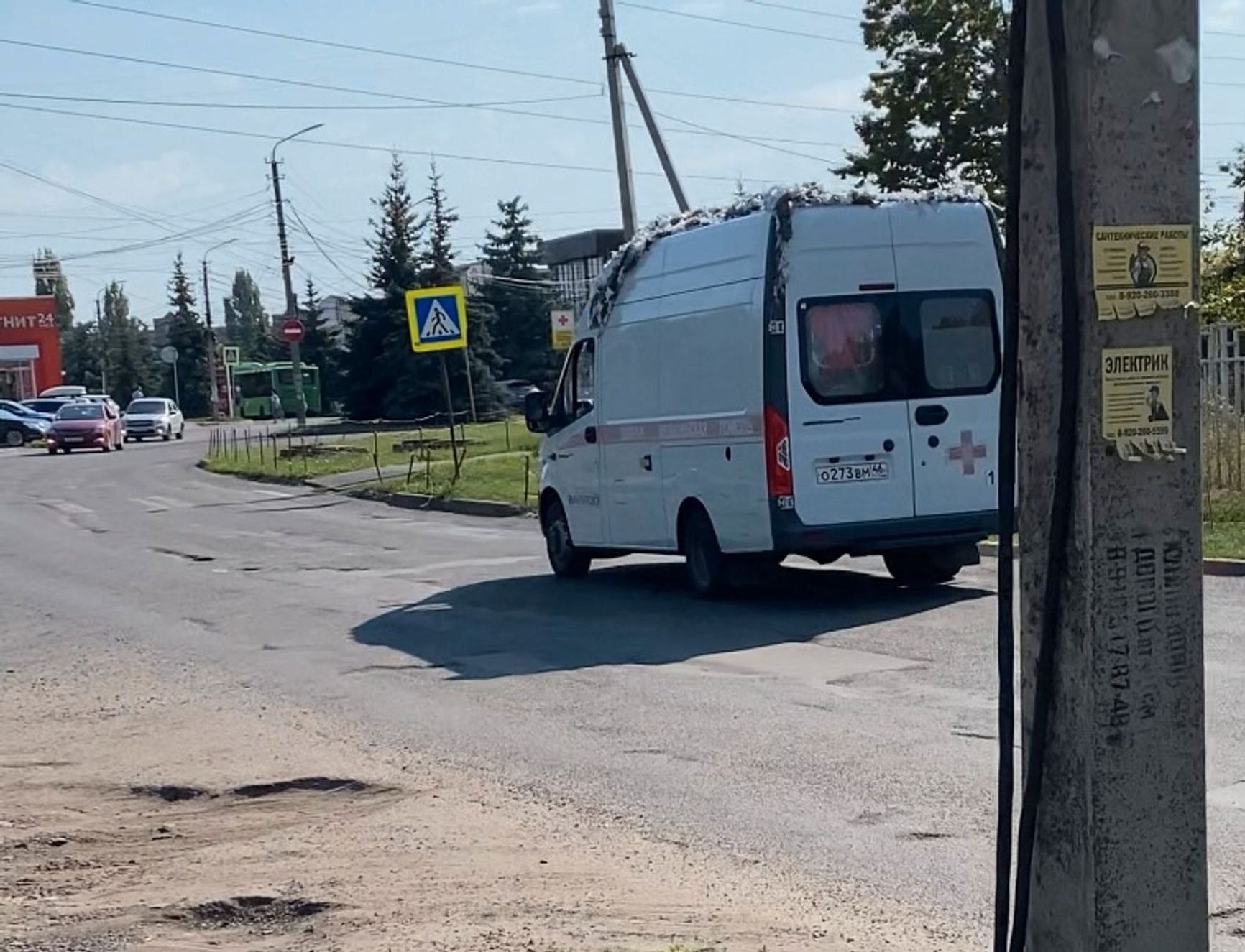 An ambulance covered with a camouflage net. Some ambulances are not marked as medical vehicles