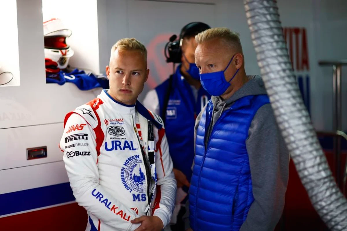 Then-Formula 1 driver Nikita Mazepin pictured alongside his father, Uralkali CEO Dmitry Mazepin, in the garage of the Haas F1 team during the Russian GP in Sochi on Sept. 25, 2021