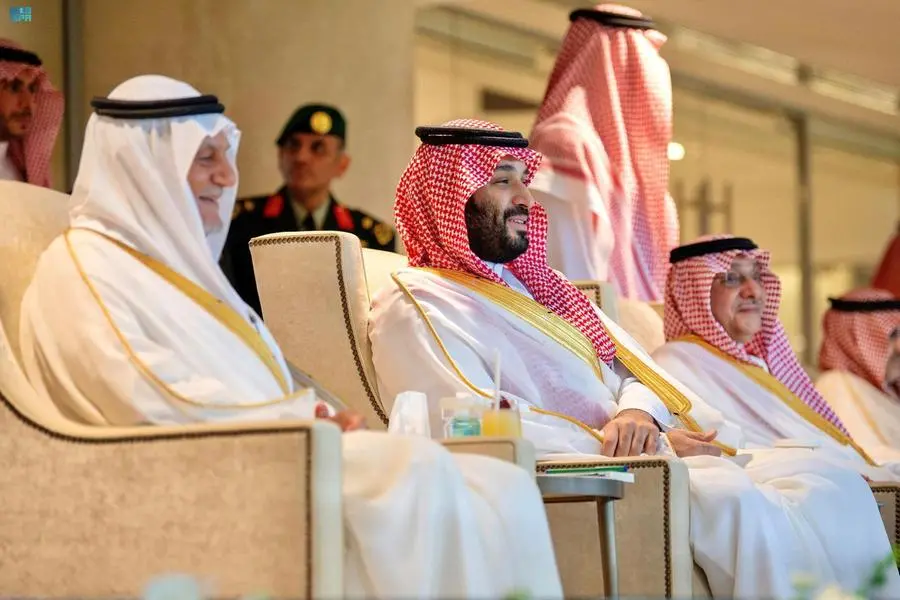 Наследный принц Мухаммед бен Сальман (в центре) на футбольном матче в Саудовской Аравии. Фото: Reuters