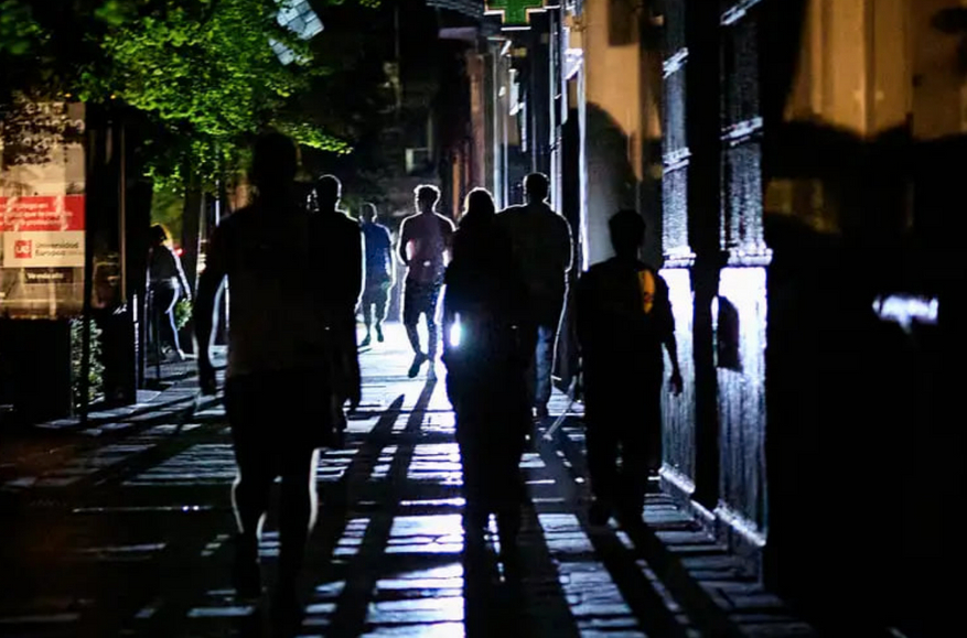 Granada residents use flashlights to navigate the streets during the April 28, 2025 blackout. Photo: NurPhoto / Getty Images